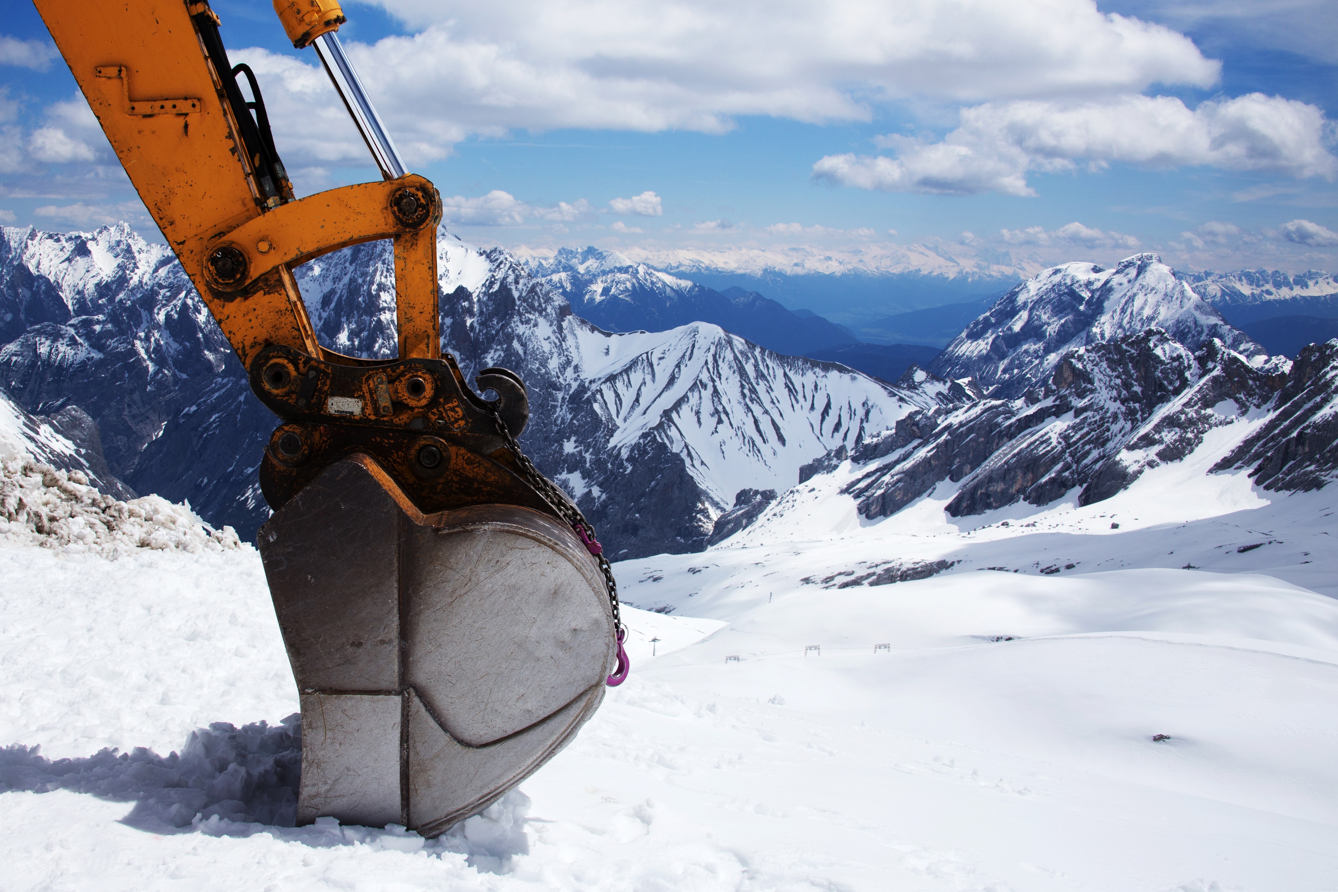 excavator bucket pin in snowy mountains